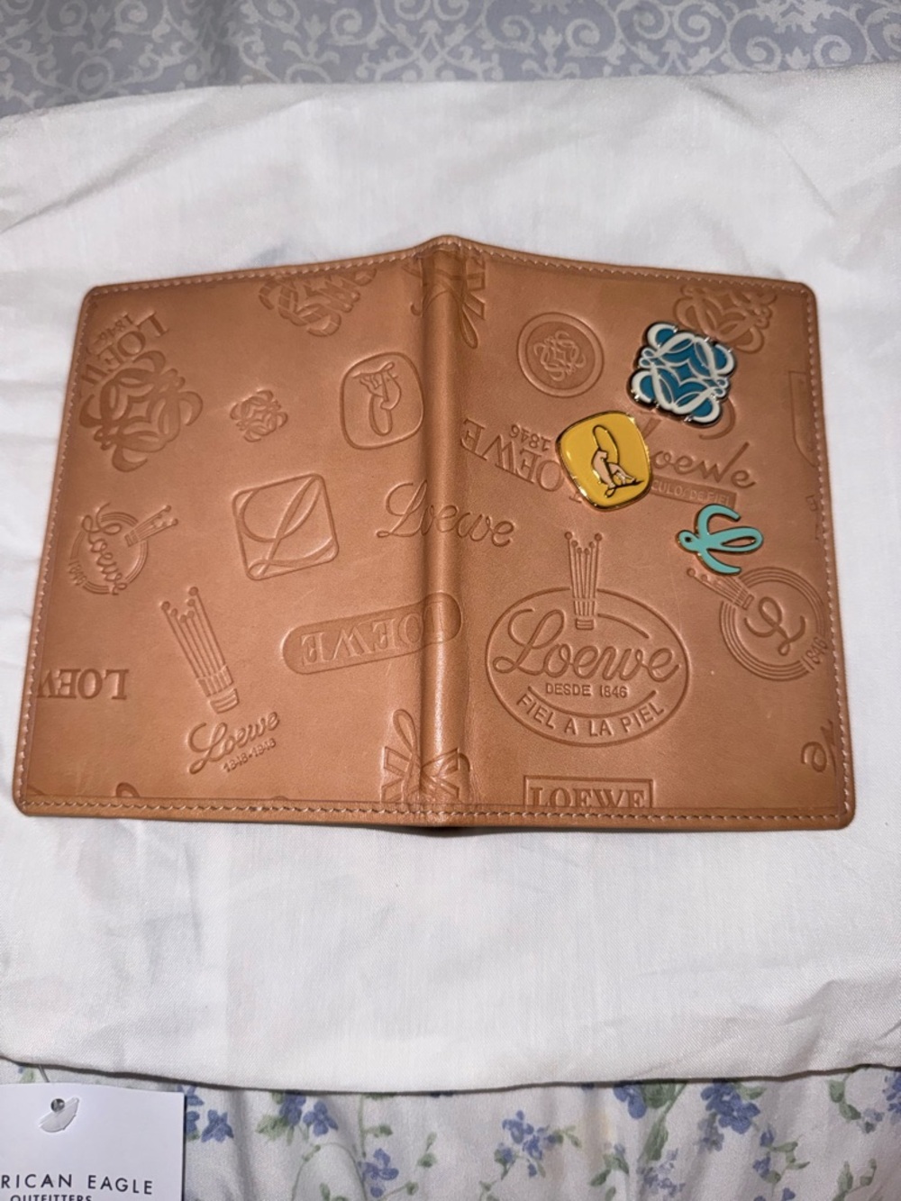 Loewe Tan Embossed Leather Passport Holder with Decorative Pins